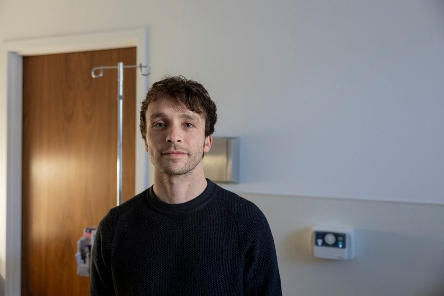 Portrait of Dr. Kyle Greenway in a clinic room
